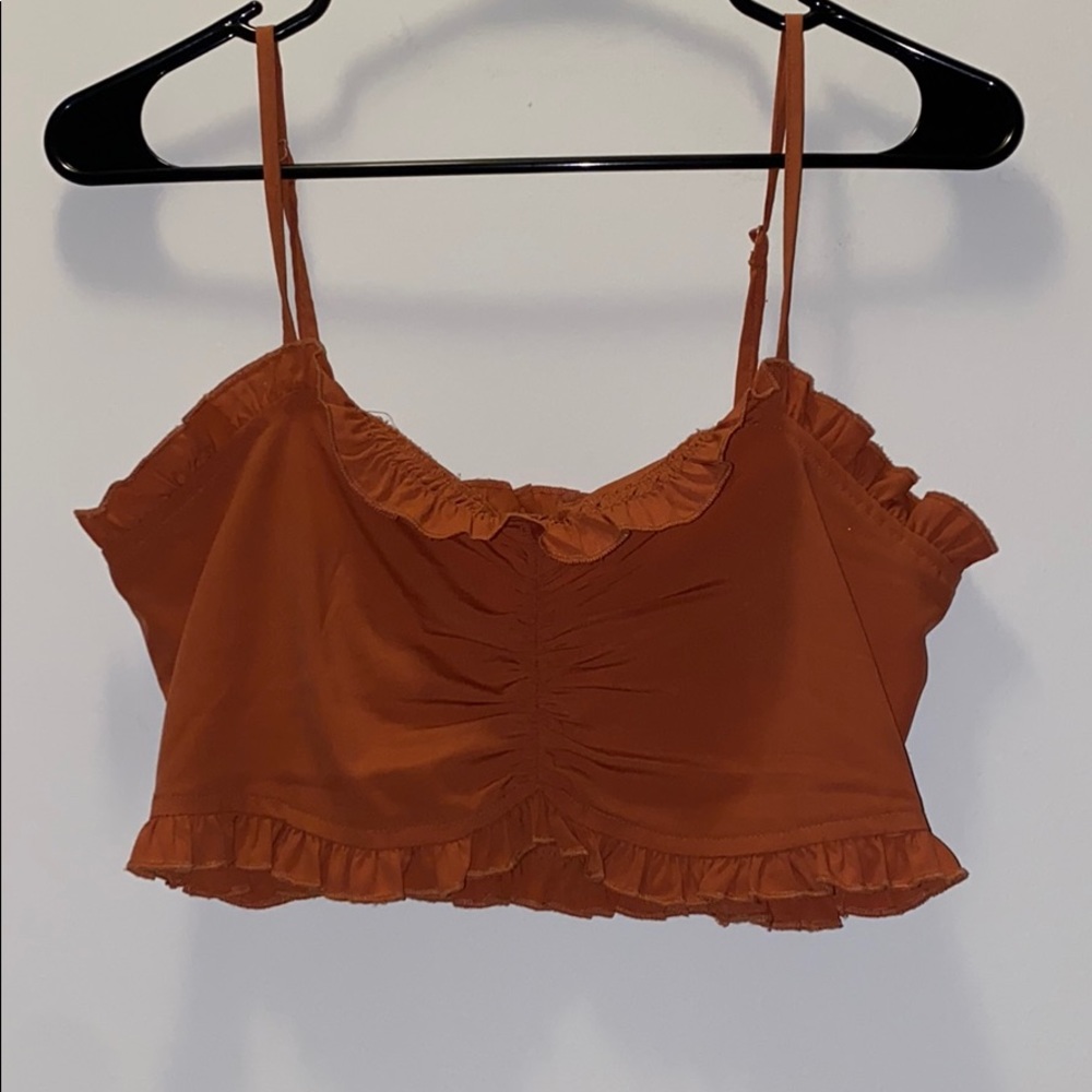 Burnt orange Urban Outfitters ruffled top!